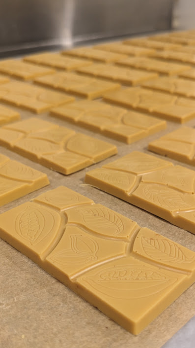 Caramelized white blonde chocolate close-up